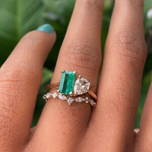 14kt yellow gold 1.53ctw emerald and diamond toi et moi ring